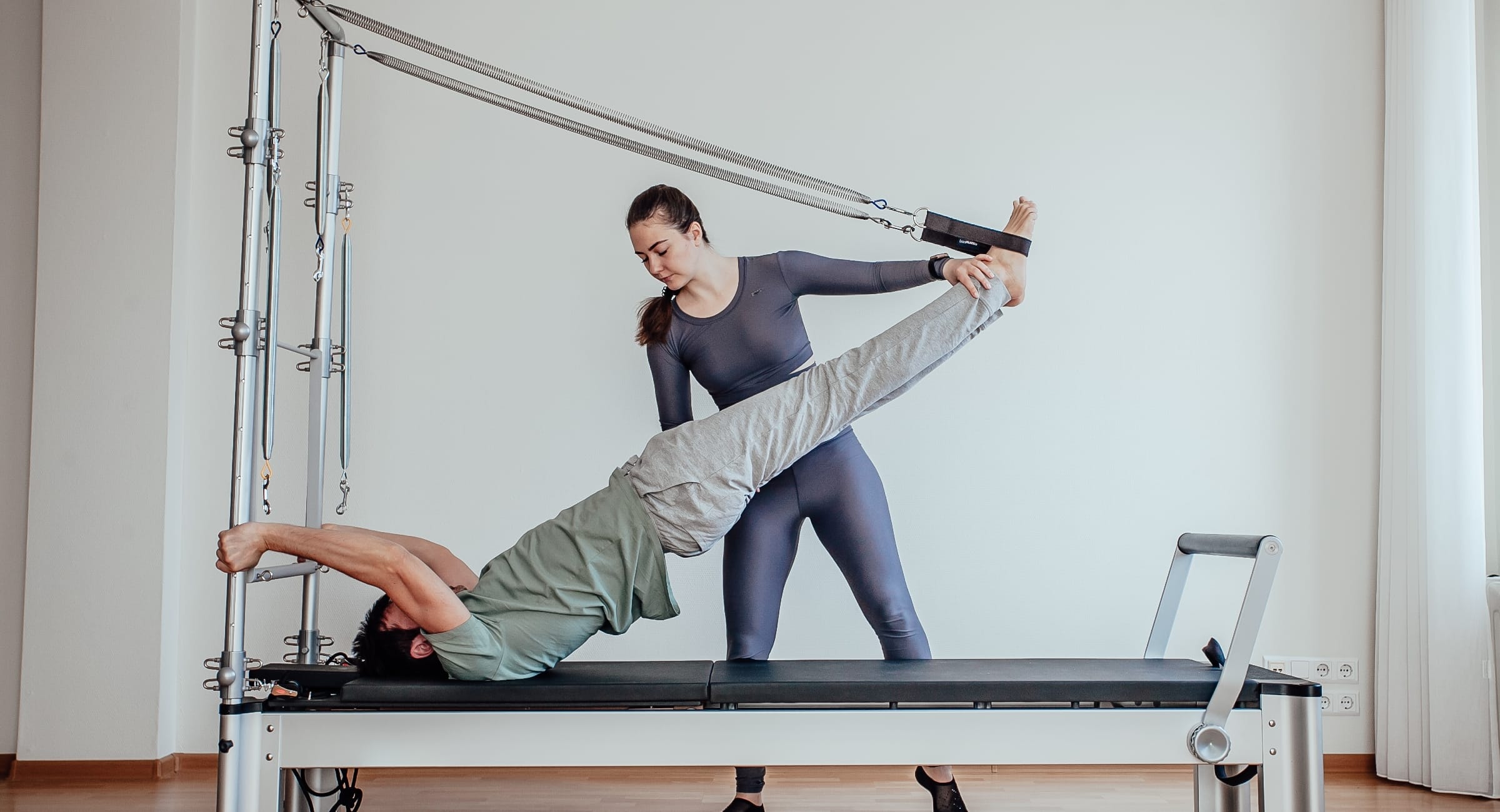 Photo of a woman doing pilates